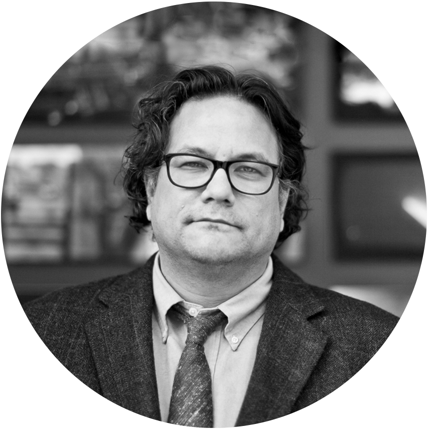 A black and white portrait of Jesse Wente, writer and public speaker